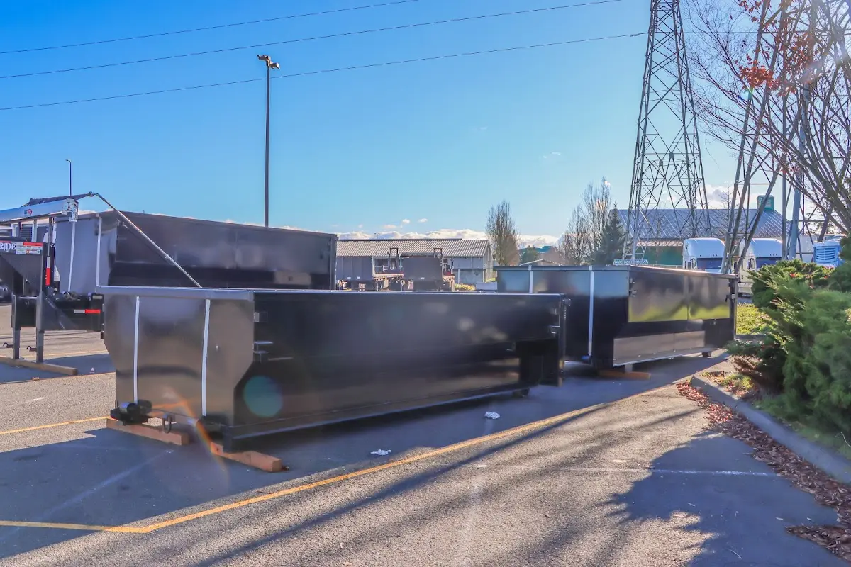 Roll-off dumpster ready for waste disposal at job site for Roofing Dumpster Rental in Akron